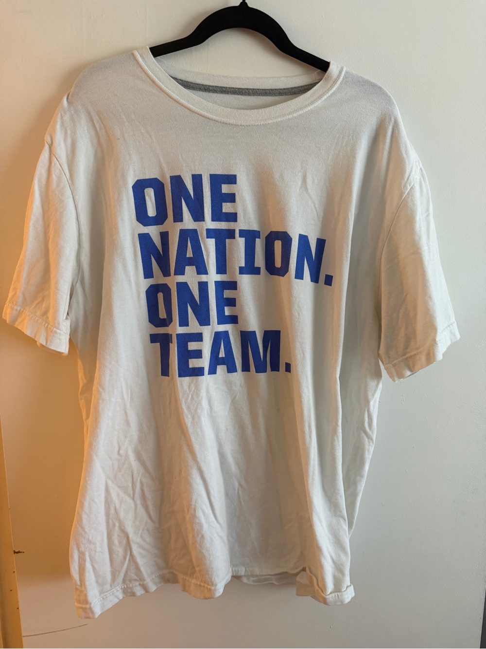Nike White Short Sleeve Tee with Blue 'ONE NATION. ONE TEAM.' Graphic
